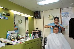 Coiffeur barbier à bord du Cuauhtémoc